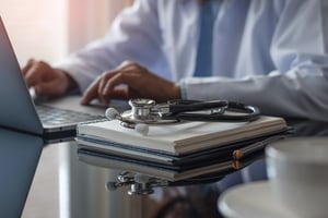 close up of doctor checking emails