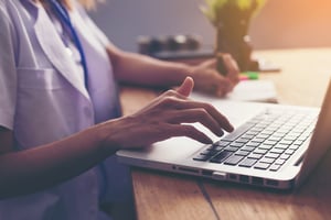 nurse using a computer