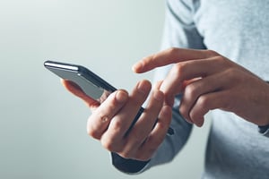 person holding smart phone